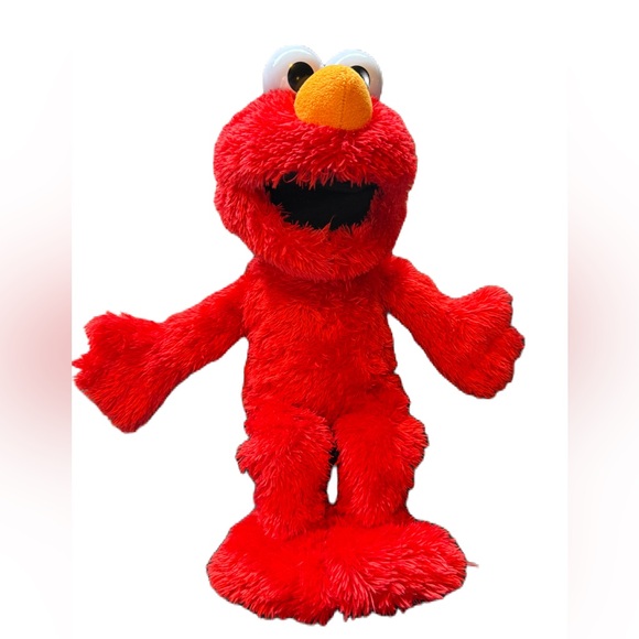 TICKLE ME ELMO. Gently Used. He moves his feet and talks. Please see my video. - Picture 1 of 8